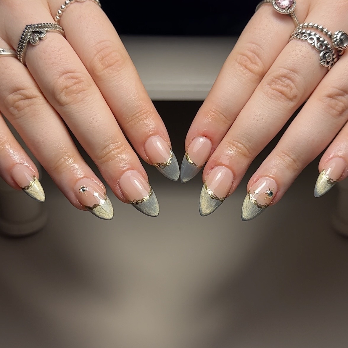 Grey and gold French tip nail art