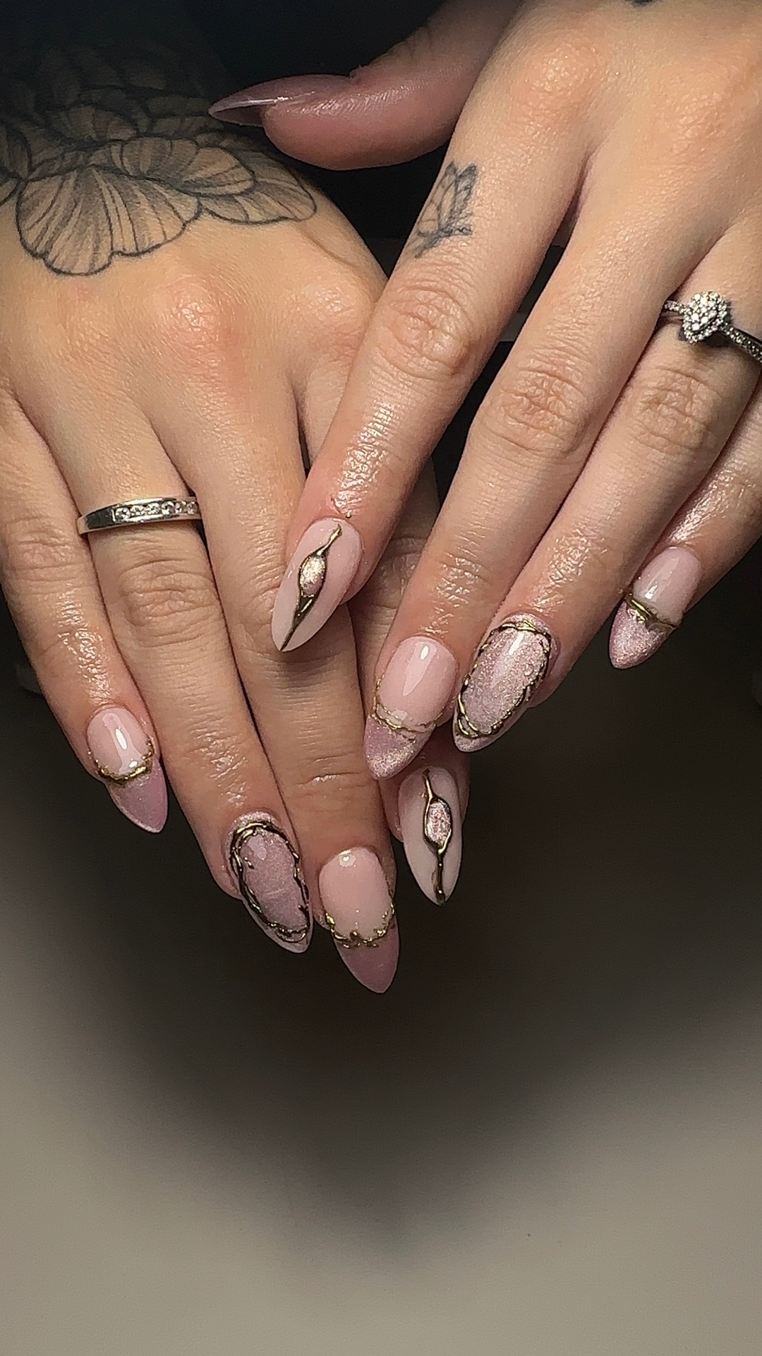 Nude gold-veined geode nail art